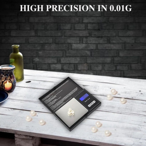 Pocket Scale With Backlit LCD Display, 200g Capacity, 0.01g Precision, shown with pearls on a table, emphasizes high precision