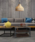 Coastal Rope Rattan Handwoven Pendant Lamp In Natural Finish illuminating a modern living room with contemporary decor.