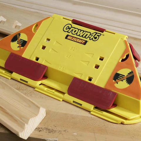 Crown Molding Cuts Made Super Easy With This Solid Miter Saw Jig for 38 45 52 degree angles with red grips.