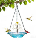 Sun Powered Hanging Bird Bath Fountain With Cascade Water Feature For Outdoor Garden Patio Backyard Lawn Decor Blue No Wiring Needed Easy Setup And Water Motion To Attract Birds And Elevate Your Outdoor Space hanging from a tree, with two birds drinking.