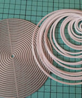 21 Piece Nesting Round Frame Metal Die Cuts Set With Circle Frame Tags For Scrapbooking Card Making Wedding DIY Photo Embossing Stencils 13.6 Cm Each Die shown on a grid surface
