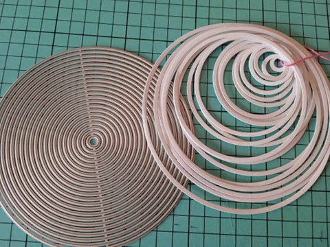 21 Piece Nesting Round Frame Metal Die Cuts Set With Circle Frame Tags For Scrapbooking Card Making Wedding DIY Photo Embossing Stencils 13.6 Cm Each Die shown on a grid surface