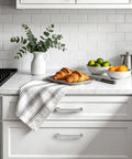 Brushed Stainless Steel Cabinet Pulls 5 Inch Hole Center on kitchen drawer with croissants and white subway tile backsplash