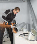 Professional Cordless Angle Grinder Runs Smooth And Hits Hard With Multi Volt Battery Interface Built Tough For Daily Cutting And Grinding Tasks in action on metal piping.