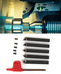Five-piece 1/4in indexable turning tool set with cemented carbide inserts and screws, laid out with a red tool handle.