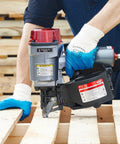 Person using Air Coil Siding Nailer 15 Degree 1 3 4 Inch To 2 3 4 Inch For Wooden Pallets Packing And Fencing Fast Shooting Durable Tool For Home Projects Ideal For Drywall And Woodwork Projects Pallet Crates And Siding Installations Beast Pro Grade Build on wooden pallets