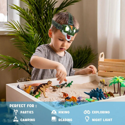 Child wearing dinosaur-themed kid friendly LED headlamp for outdoor adventures with roar and silent modes, playing with toys indoors.