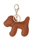 Premium Faux Leather Dog Bag Charm With Sturdy Metal Keyring for trendy handbags, brown dog design with golden clip.