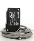 Close-up of UL325 Retroreflective Photoeye Kit for Gates and Doors with coiled cable, label details visible
