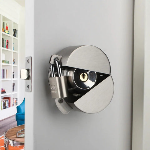 Door Knob Lockout Gadget with padlock and stainless steel lock cover installed on door for privacy protection, preventing keyhole access.