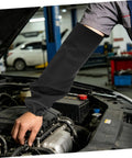 Legit Flame Resistant Welding Sleeves And Built Different Cotton Arm Guards offering heat protection while working under a car hood.