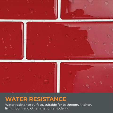 Close-up of red glossy peel and stick kitchen backsplash tiles with water droplets showing water resistance.
