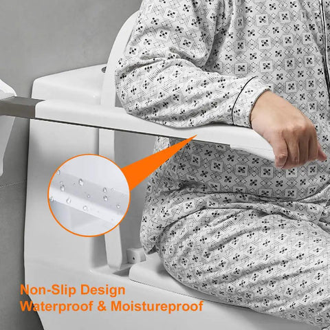 Person using 27.5 Inch Stainless Steel Bathroom Grab Bar With Foldable Skid Resistant Toilet Safety Rail For Disabled And Seniors Plus Seat Support Durable Handicap Bath Accessory