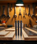 No Nonsense Center Punch Set With Rock Solid High Carbon Steel Build, three sizes displayed on a workbench.