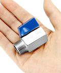 Hand holding 4 Pack Durable 304 Stainless Steel Ball Valve With 1/2 Inch NPT Female And Male Threads Shut Off Valves