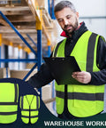 Warehouse worker wearing a fluorescent green and black reflective safety vest with pockets and zipper, holding a clipboard.