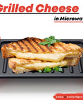 Maconee Microwave Grill For Melty Cheesy Sandwiches And Crispy Paninis with grilled cheese sandwich on thermal plate.