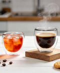 Double Wall Insulated Espresso Cups 5 Oz Glass Set Of 2 For Coffee Machines with hot and iced drinks on kitchen counter