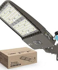 Switchable LED Parking Lot Light 280W-300W-320W with shoebox design, mounted next to package showcasing product box.