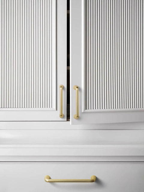 Super Slick 5 Pack Gold Cabinet Pulls With Brushed Brass Finish, 3.75 Inch Hole Center Zinc Alloy Drawer Handles on white cabinets.