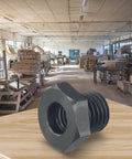 Front view of wood lathe chuck adapter, M18x2.5 to 1-8TPI, metal dark gray on workshop bench