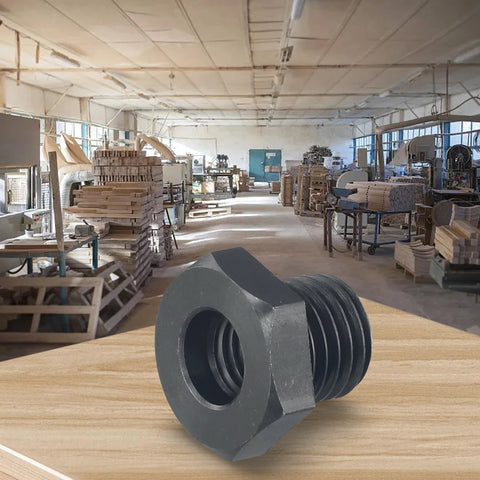 Front view of wood lathe chuck adapter, M18x2.5 to 1-8TPI, metal dark gray on workshop bench