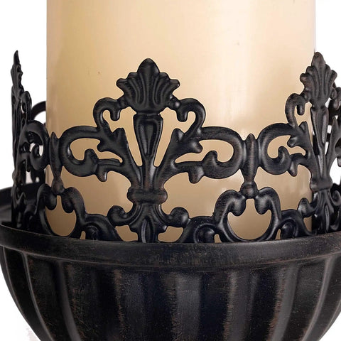 Close-up of handcrafted black iron wall sconce design with crown and scepter detail for candle holder, included in Kick Up Your Living Room Vibe With These Dope Black Gothic Wall Sconces Set Of Two Handcrafted Iron Crown And Scepter Candle Holders For Vintage Home Decor Style.