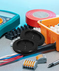 Black Rubber Grommet Kit For Cable Management With Dual Sided Buckle Design, Fire Resistant And Waterproof Desk Hole Cover For Office And Home Use, Includes Four Pieces on desk with wires