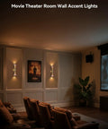 Gold Movie Theater Style Wall Sconce With Up And Down Lighting Dimmable in a cozy home theater room.