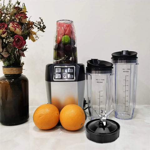 7 Fin Blender Blade Replacement Compatible With Auto IQ Blenders next to fruits and empty cups, flowers in background.