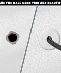 White wall cable grommet installed with black cable passing through wall hole