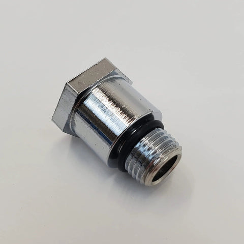 Chrome oil pressure gauge adapter fitting with hex nut and male threads, close-up view.