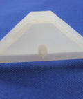 Close-up of a 12 Pack 90 Degree Cabinet Triangle Brackets White Durable Plastic Corner Support Brace with Off Center Screw Hole for Easier Access.