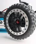 Tune Up Your Ride With These 8 Fresh Red M4 Flange Lock Nuts Built For 1 10 Scale Rc Cars Featuring Serrated Nylon Inserts And Lightweight Aluminum Wheels Upgraded Replacement Hardware. Close-up of black RC car wheel with serrated flange and red nut.
