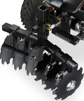 28-Inch Heavy-Duty Disc Plow Harrow With Universal 2-Inch Receiver attached to ATV, showcasing steel build for tough farm work.