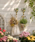Vintage Flower Wall Hooks, Distressed Metal Coat Rack Set, Ace Farmhouse Entryway Organizer with hanging flowers.