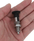 Heavy Duty Stainless Steel Self Locking Spring Plunger Pin With Kickass Safety Latch And Slick Indexing Action For Demanding Industrial Jobs Gearbox And Rigging held in a hand.