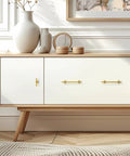 Gold Cabinet Handles 3 Inch 76mm Pack Of 3 Minimalist Modern Dresser Pulls for cabinets on a white sideboard