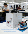 Pro Grade 110V Commercial Curtain Steamer With 4L Tank And 3KG Steam Flow Adjusted By Visual Gauge For Knocking Stubborn Wrinkles Right Off Heavy Drapes And Factory Garments Without Scale Headaches in a textile factory setting.