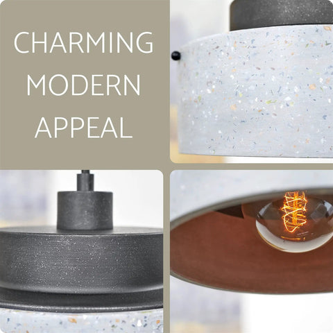 Close-up of Xander 11 Inch Modern Pendant Light With Concrete Drum Shade And Textured Black Finish showing bulb and shade details.