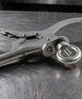 Bulletproof 9 Inch Drill Press Locking Clamp With Killer Jaw Tension for secure holding on workpieces, close-up view.