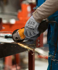 Person using power tool while wearing Cut Resistant Gloves PU Coated Three Pairs ANSI A2 Lightweight Safety Work Gloves For Industrial And Construction Use Medium Gray Built Tough For Real Jobs With 13 Gauge Seamless Knit And Comfortable Fit With Abrasion Protection And Great Palm Grip