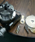 8 Inch Precision Horizontal Vertical Rotary Table With 6 Inch Three Jaw Chuck Dual Index Plates, off-white toothed index plates visible.
