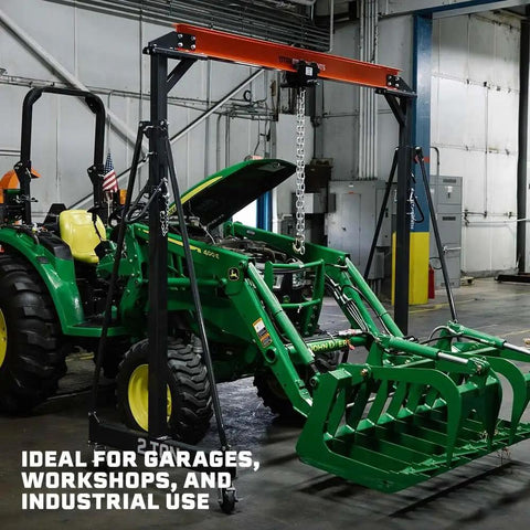 Beefy Adjustable Gantry Crane Frame For Lifting Up To 1 Ton With Locking Wheels Portable Shop Lift Hoist Rated 2,000 LB Height Up To 12 Feet Heavy Duty Steel Construction Frame Only, shown lifting a tractor in a workshop.
