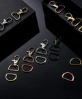 100 Piece Hardcore Swivel Keychain Clips With D Rings And Lobster Clasps, assorted colors and styles on black background.
