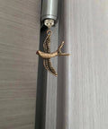 Swallow Shaped Brass Hinge Head Decorative Toppers For Door Hinge Pins With Magnetic Design installed on door