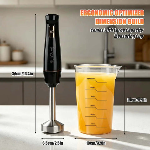 800W Corded Handheld Immersion Blender With Four Sharp Stainless Steel Blades Multi Speed Controls And One Touch Pulse For Effortless Soups And Smoothies Made Easy By This Heavy Duty Kitchen Game Changer Black next to a large capacity measuring cup with orange liquid.
