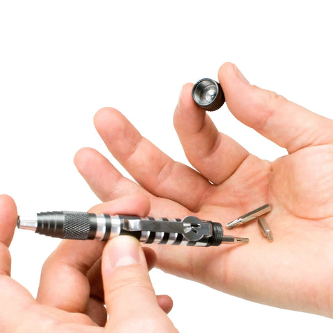 Close-up of 4.8 Inch Magnetic Bit Driver with Built In Bit Storage and Aluminum Body, showing hand-accessible bits, knurled grip, black.