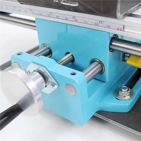 Close-up of the 400W Mini Metal Lathe Machine With Adjustable Speed For Precision Milling Wood and Soft Metals showing the aluminum base and tailstock.