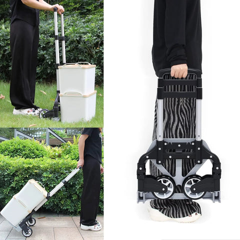 Folding telescoping hand truck carrying boxes outdoors
